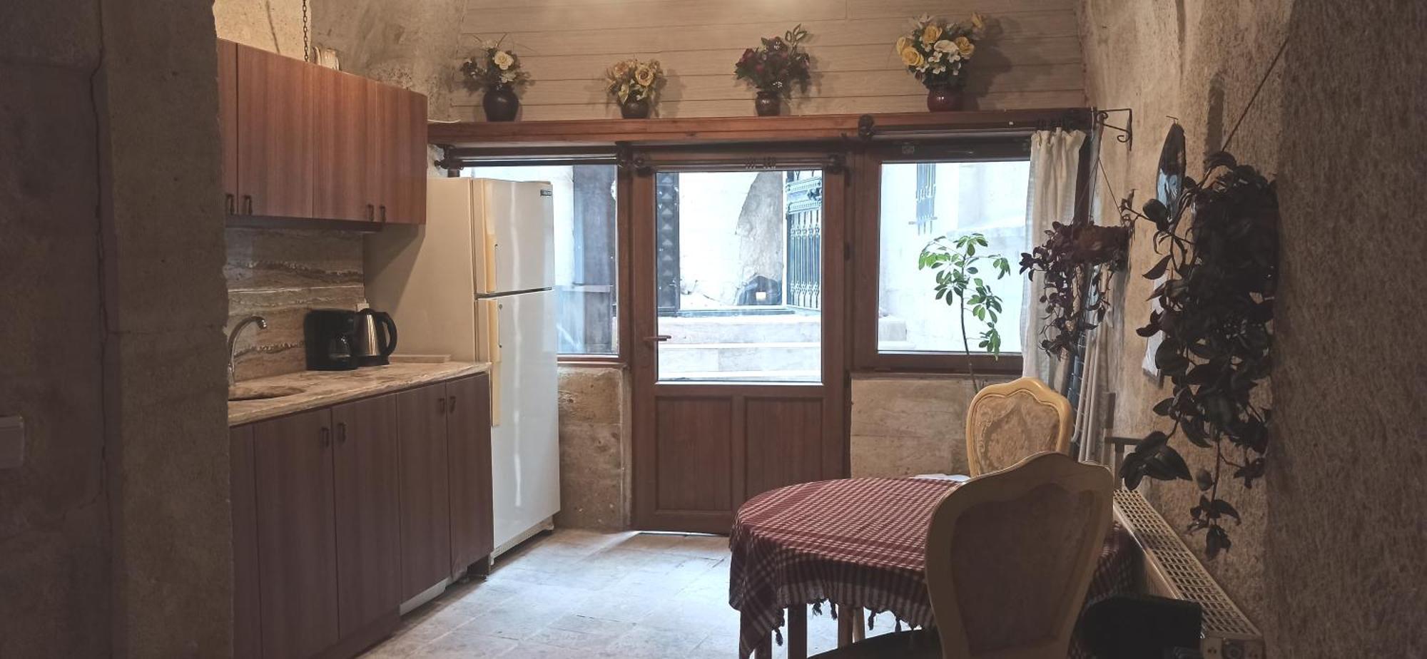 Adelya Cave Hotel Apartments Гореме Номер фото
