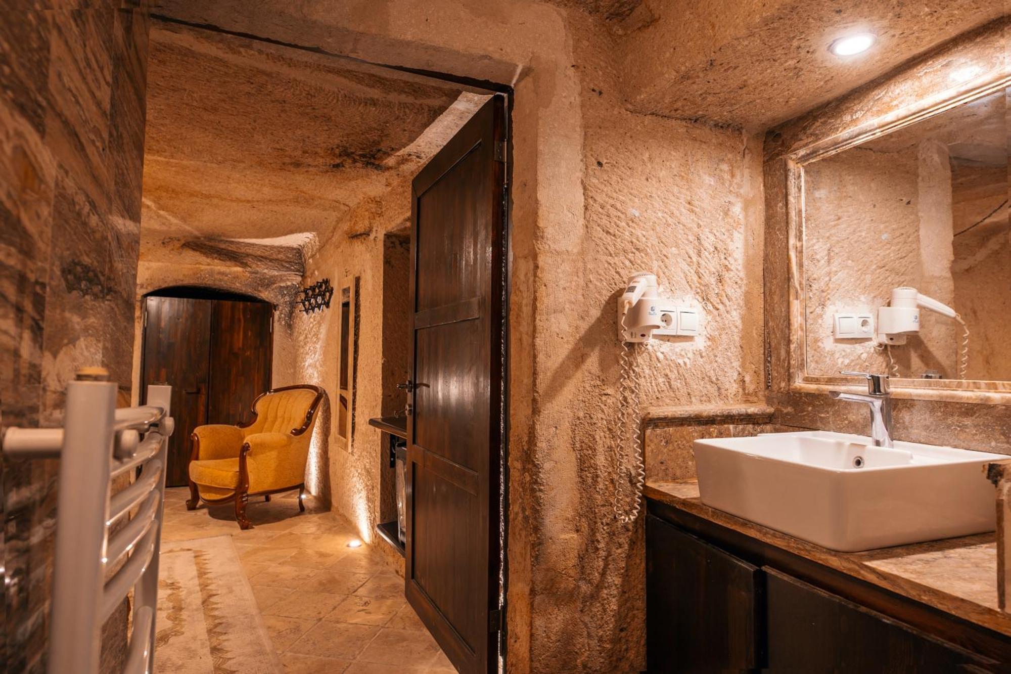 Adelya Cave Hotel Apartments Гореме Номер фото