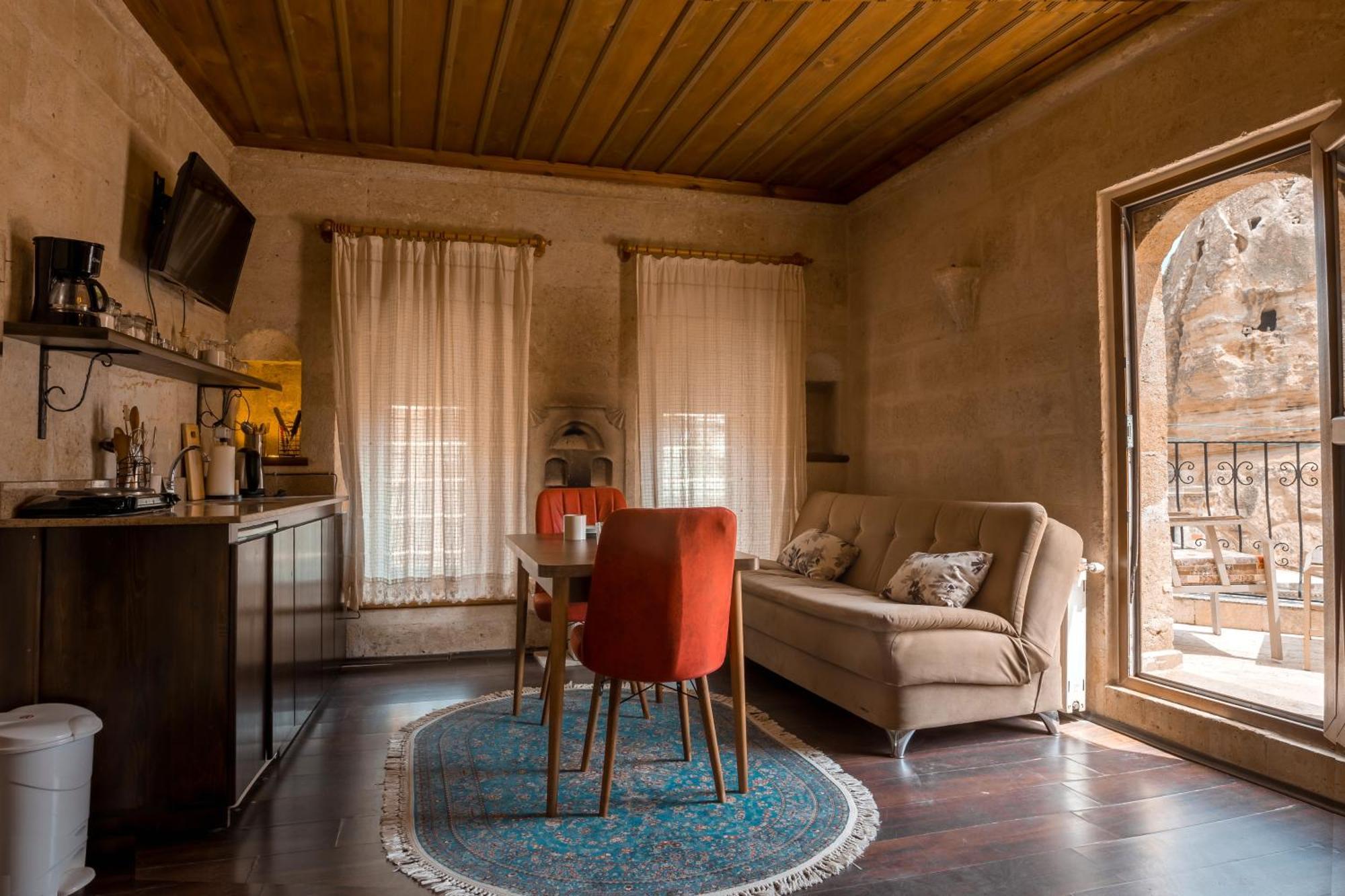 Adelya Cave Hotel Apartments Гореме Номер фото